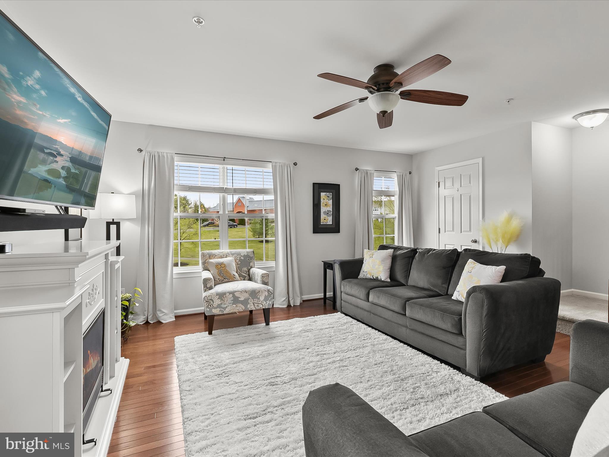 1410 Wellspring Drive Aberdeen, MD 21001 - Photo 11 of 55 a living room with furniture and a large window
