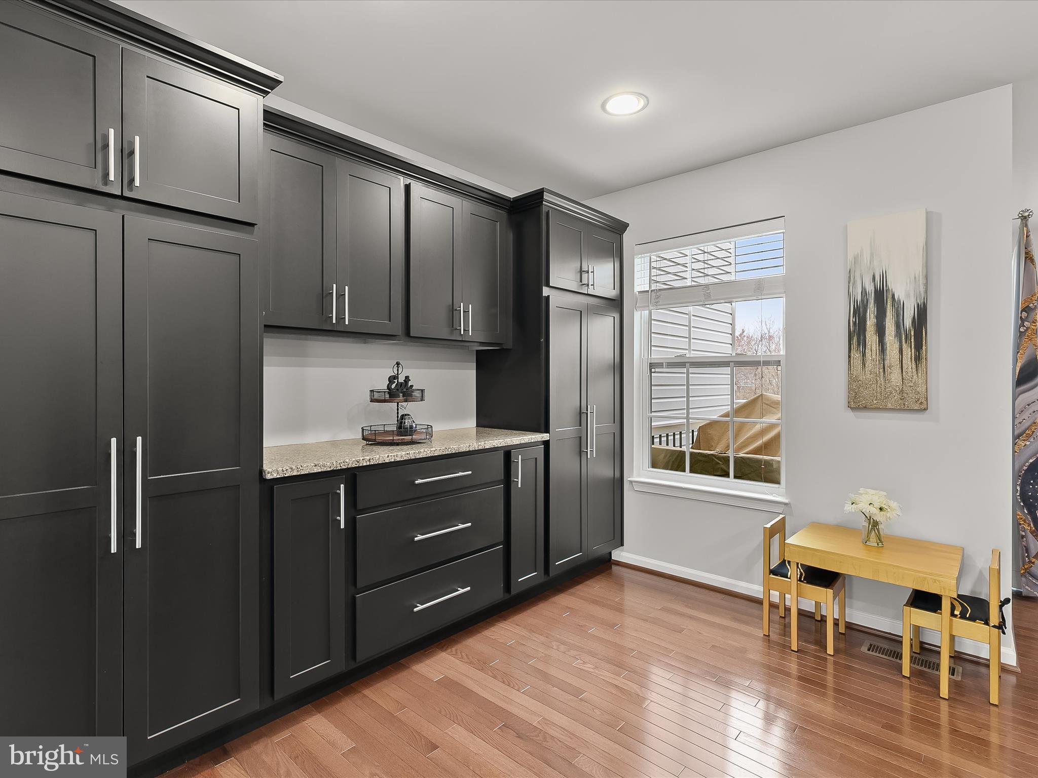 1410 Wellspring Drive Aberdeen, MD 21001 - Photo 51 of 55 a room with a chair and a refrigerator