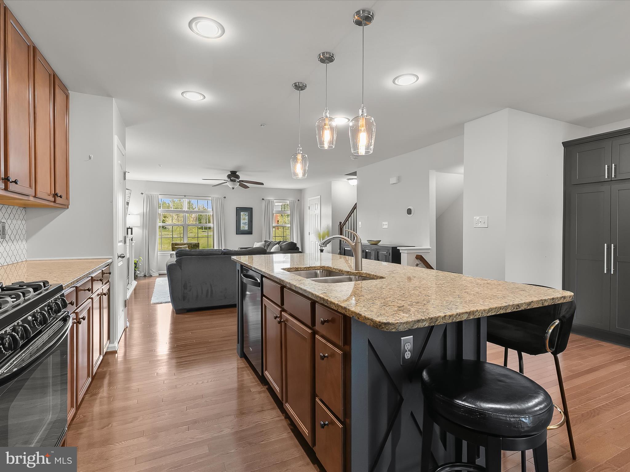 1410 Wellspring Drive Aberdeen, MD 21001 - Photo 14 of 55 a large kitchen with a table and chairs