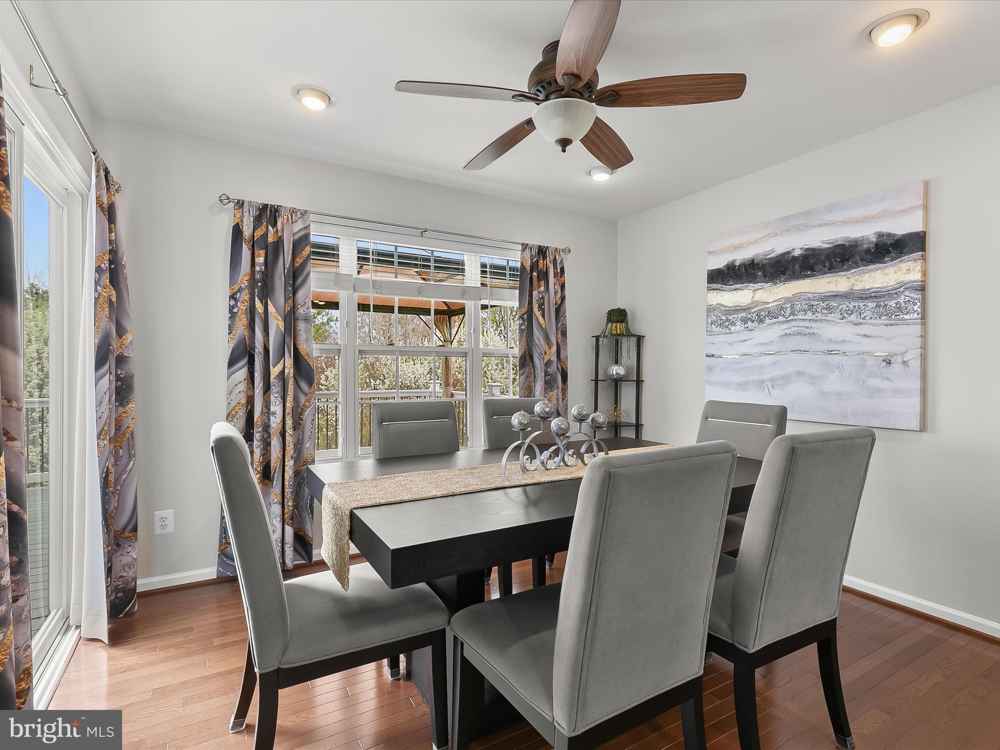 1410 Wellspring Drive Aberdeen, MD 21001 - Photo 20 of 55 a view of a dining room with furniture window and wooden floor
