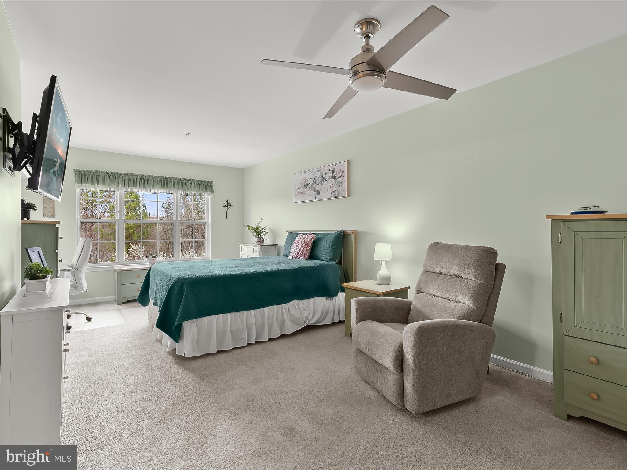 1410 Wellspring Drive Aberdeen, MD 21001 - Photo 24 of 55 a bedroom with a bed couch and window