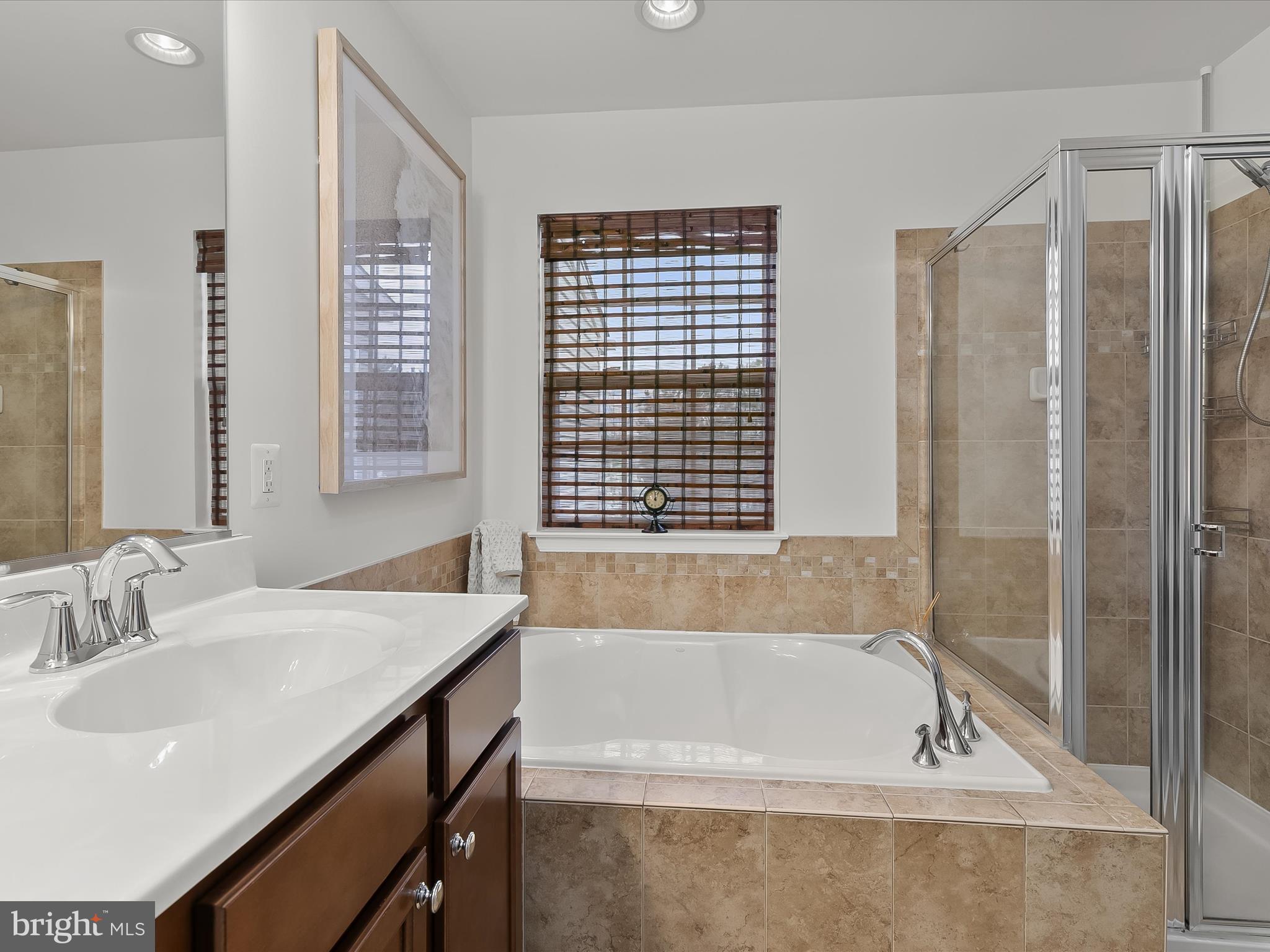 1410 Wellspring Drive Aberdeen, MD 21001 - Photo 27 of 55 a bathroom with a bathtub and a sink