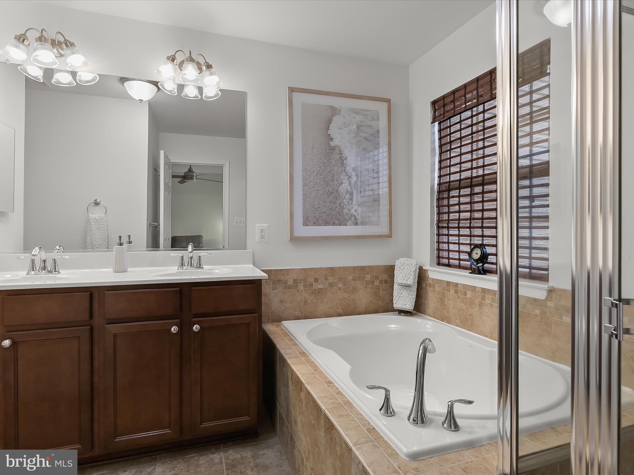 1410 Wellspring Drive Aberdeen, MD 21001 - Photo 28 of 55 a bathroom with a tub sink and mirror