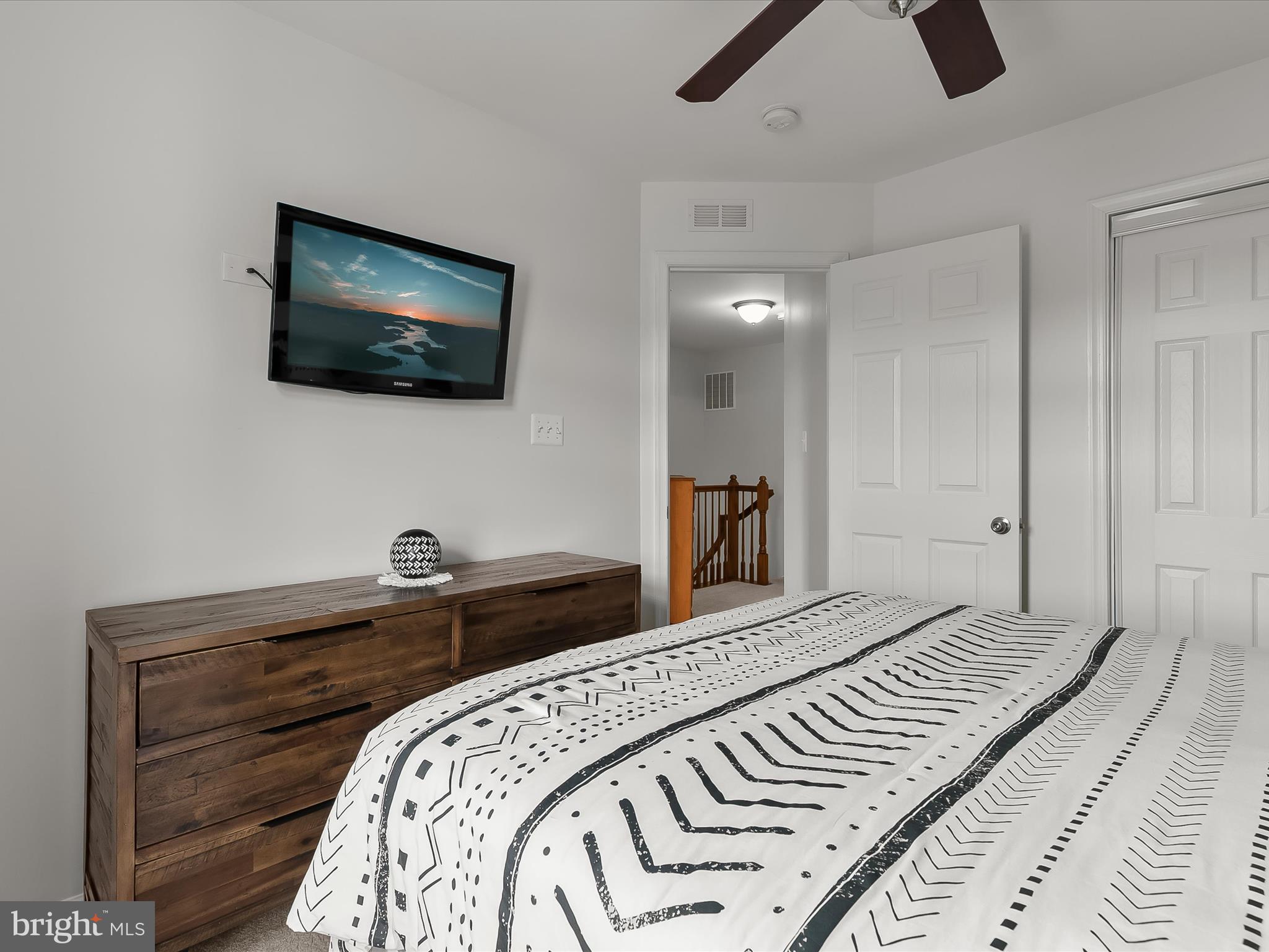 1410 Wellspring Drive Aberdeen, MD 21001 - Photo 31 of 55 a bedroom with a bed and a flat screen tv