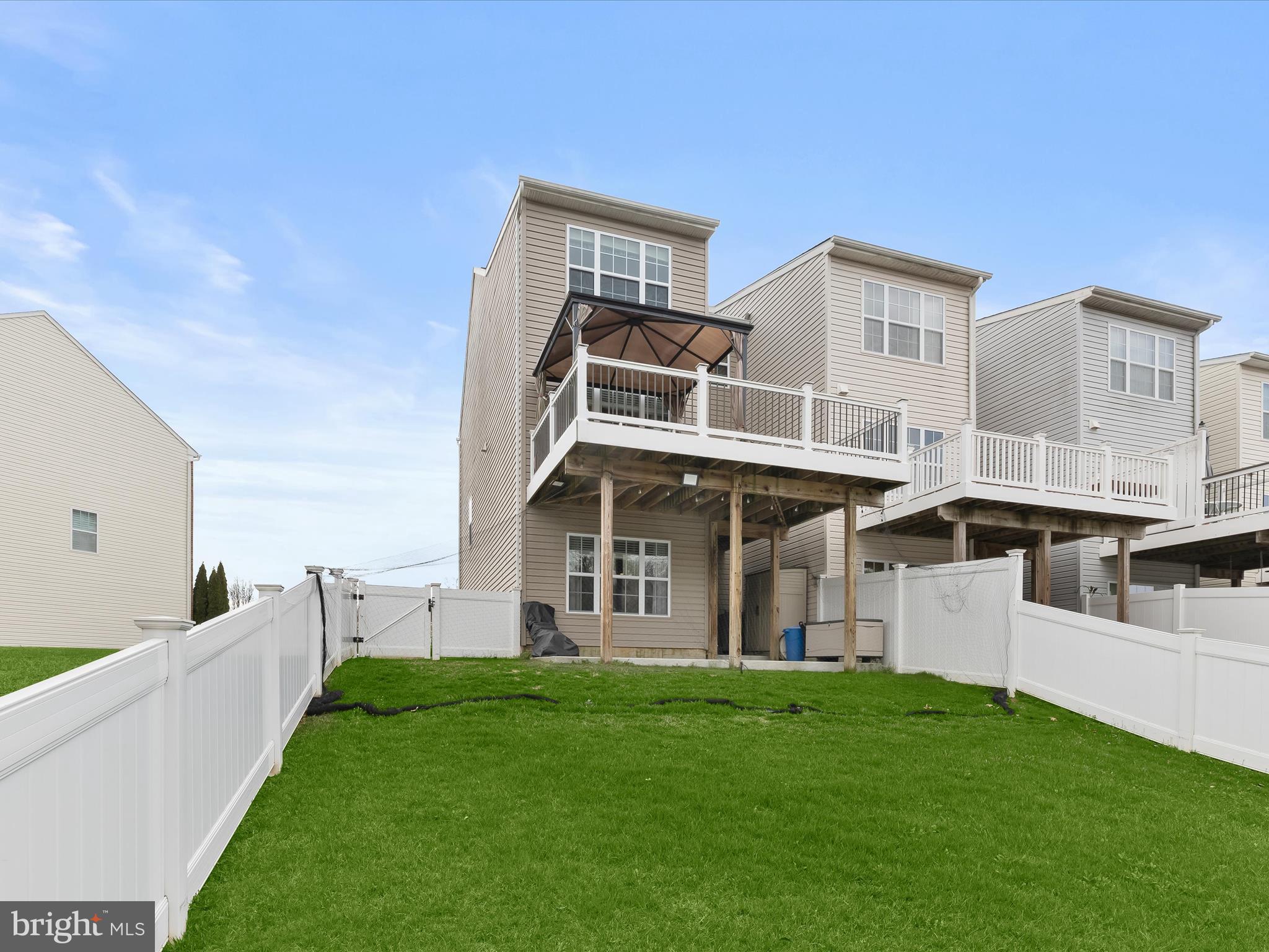 1410 Wellspring Drive Aberdeen, MD 21001 - Photo 38 of 55 a front view of a house with a yard