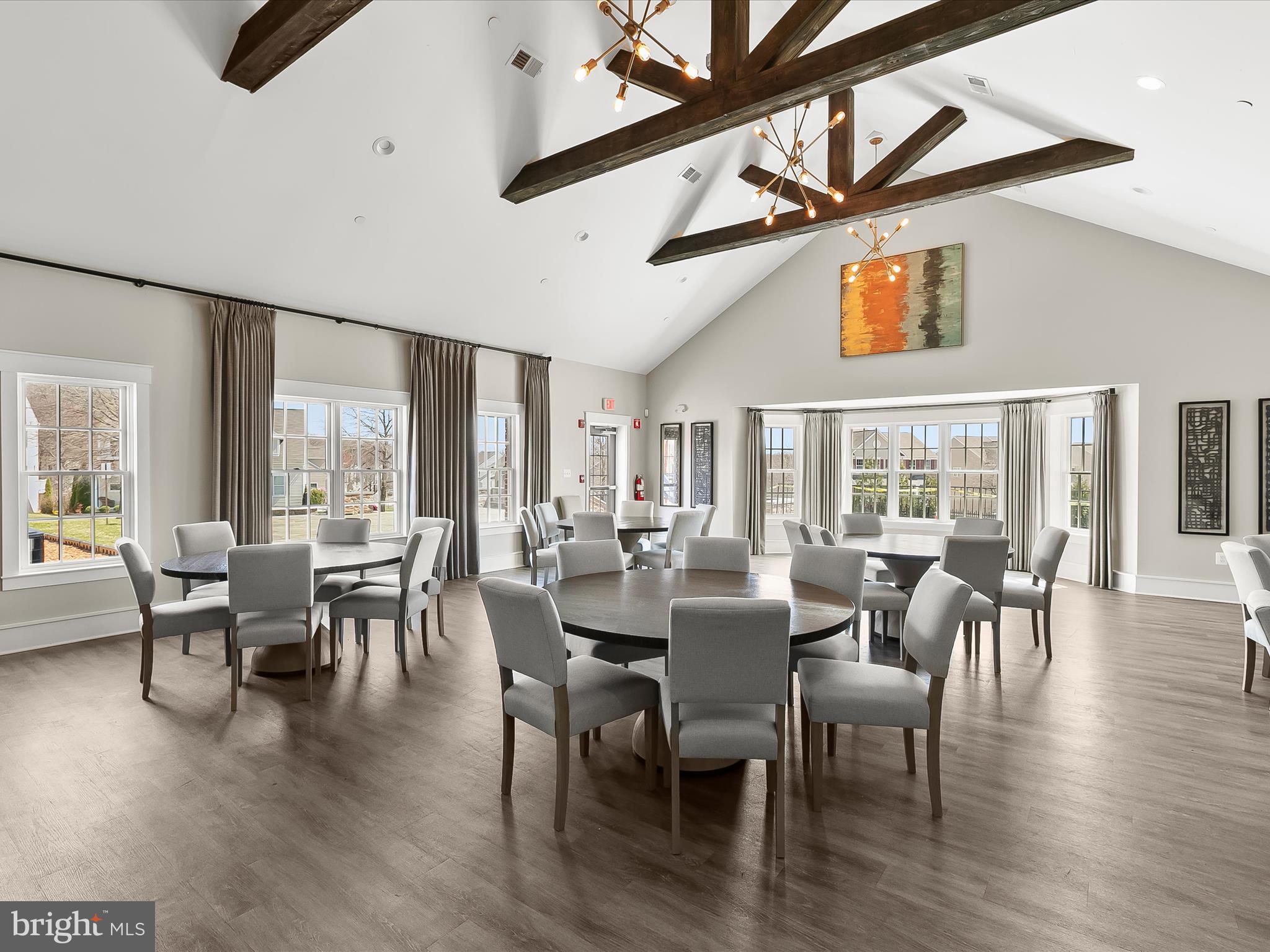1410 Wellspring Drive Aberdeen, MD 21001 - Photo 44 of 55 a view of a dining room with furniture window and wooden floor
