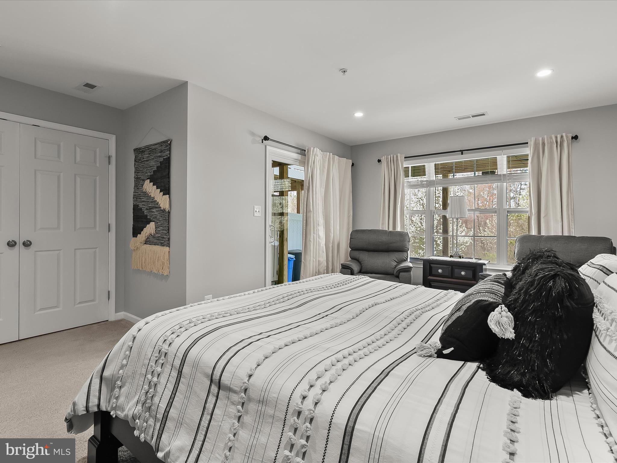 1410 Wellspring Drive Aberdeen, MD 21001 - Photo 7 of 55 a bedroom with a bed mirror and window