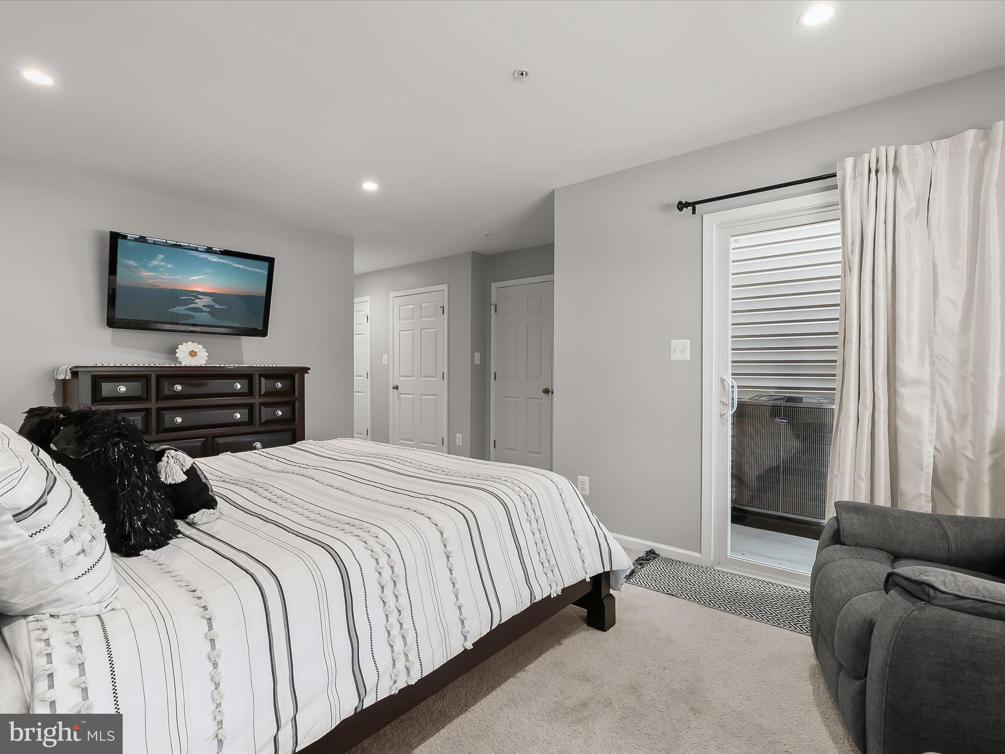 1410 Wellspring Drive Aberdeen, MD 21001 - Photo 8 of 55 a bedroom with a bed and a couch