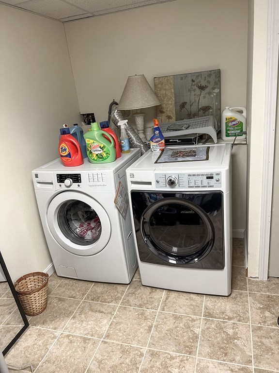35 Robert Road Tyngsborough, MA 01879 - Photo 14 of 25 a utility room with dryer and washer