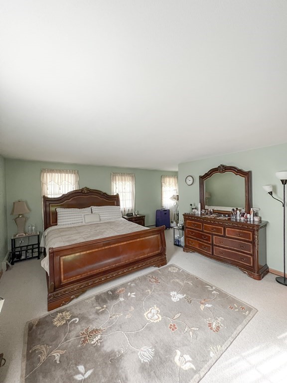 35 Robert Road Tyngsborough, MA 01879 - Photo 19 of 25 a bedroom with furniture and window