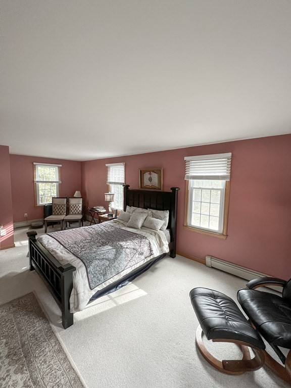 35 Robert Road Tyngsborough, MA 01879 - Photo 25 of 25 a bedroom with a bed and window