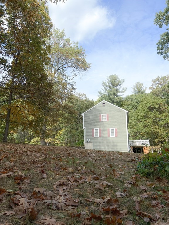 35 Robert Road Tyngsborough, MA 01879 - Photo 3 of 25 a view of a house with a yard