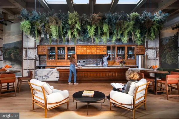 a outdoor living space with patio furniture and a potted plant