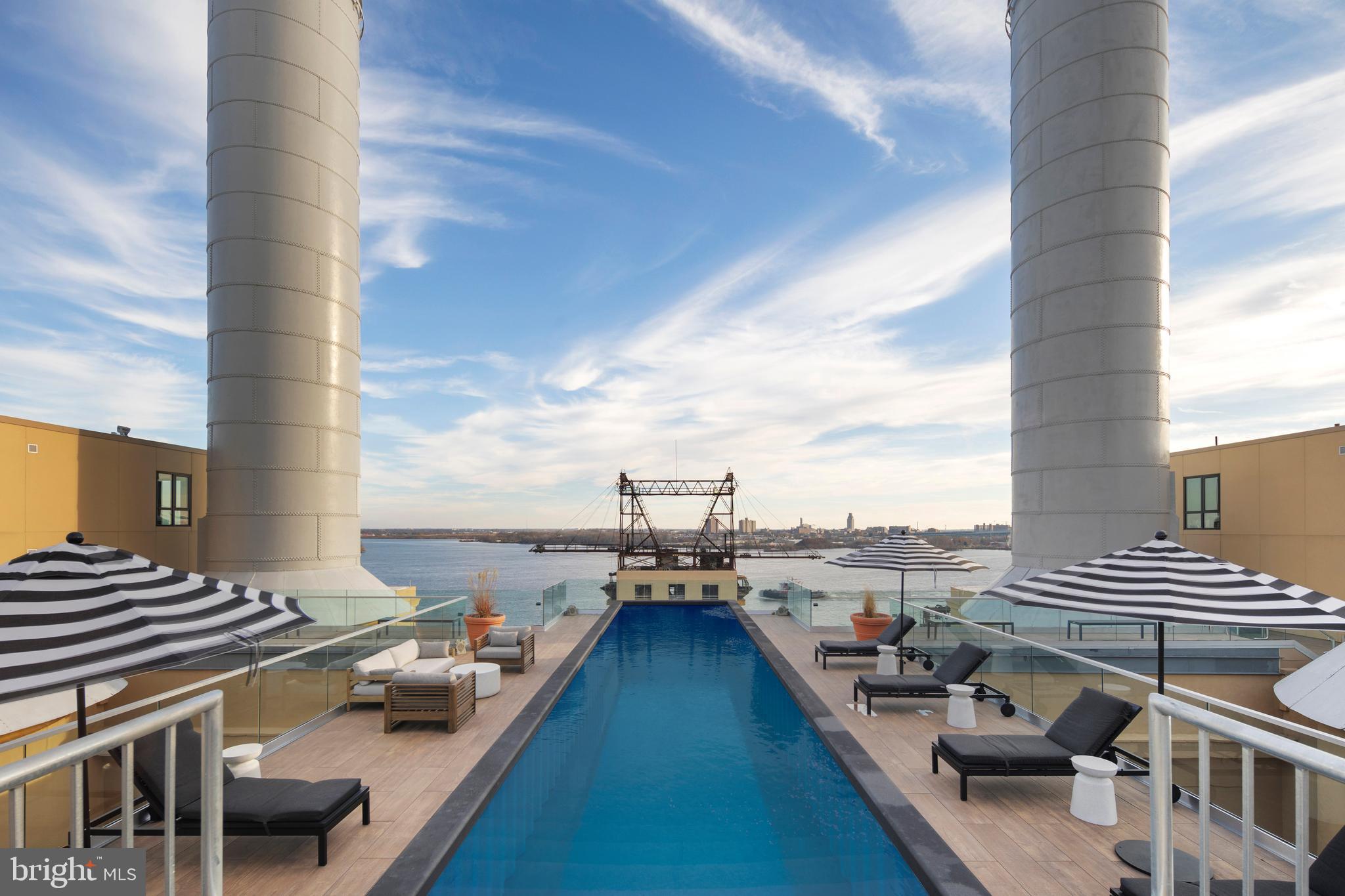 1325 North Beach Street, Unit 720 Philadelphia, PA 19125 - Photo 15 of 19 a view of balcony with couch and chairs