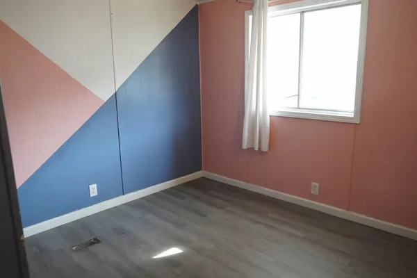 an empty room with windows
