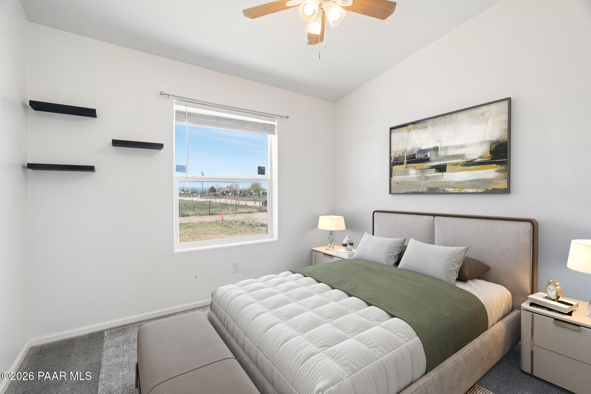 575 Ranch House Road Paulden, AZ 86334 - Photo 19 of 36 a bedroom with a bed and a painting on the wall