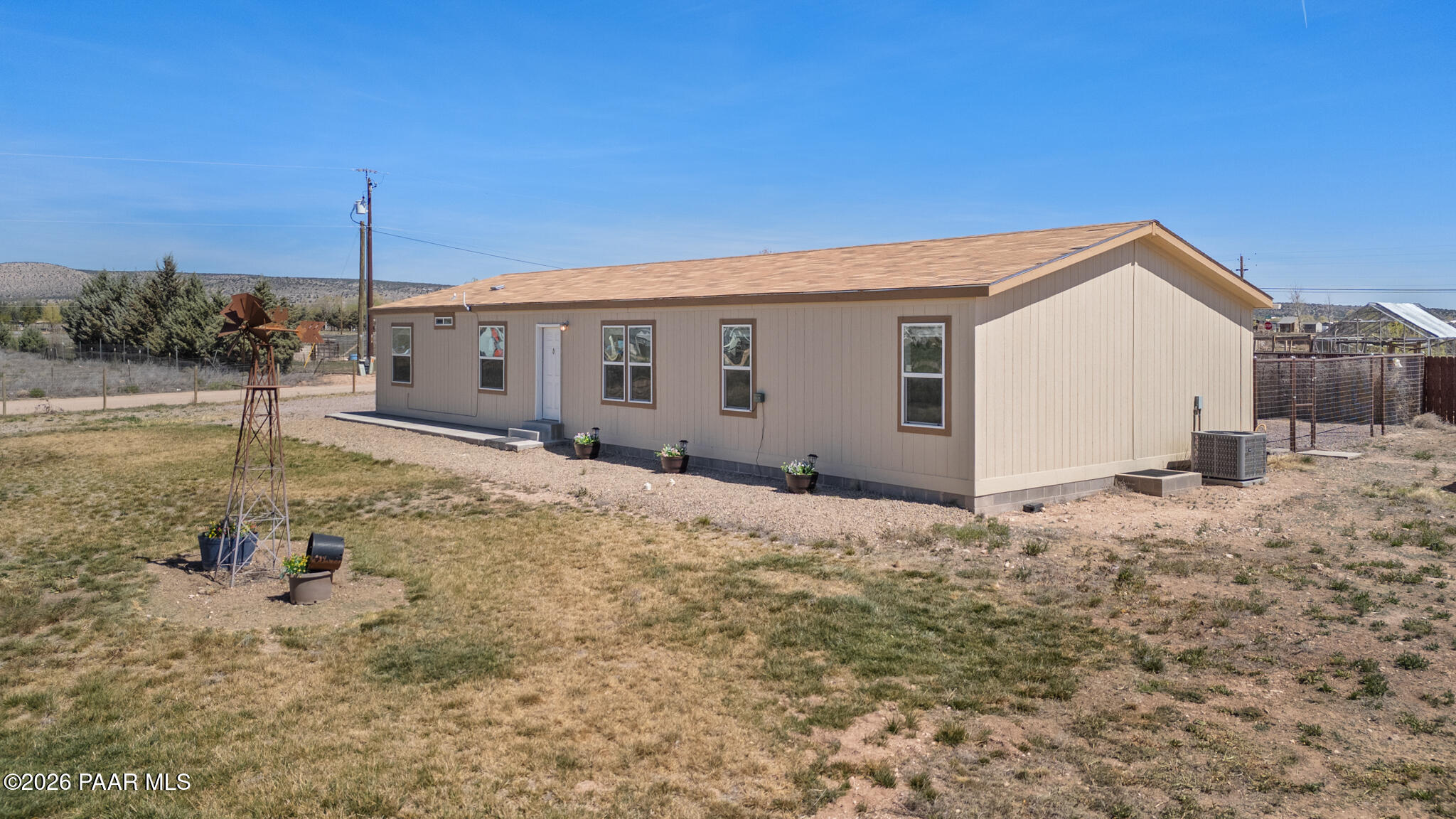 575 Ranch House Road Paulden, AZ 86334 - Photo 27 of 36 a view of a house with a backyard