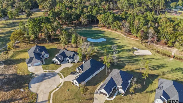 a view of swimming pool with seating space