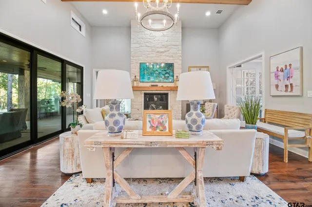 a dining room with furniture a rug and wooden floor
