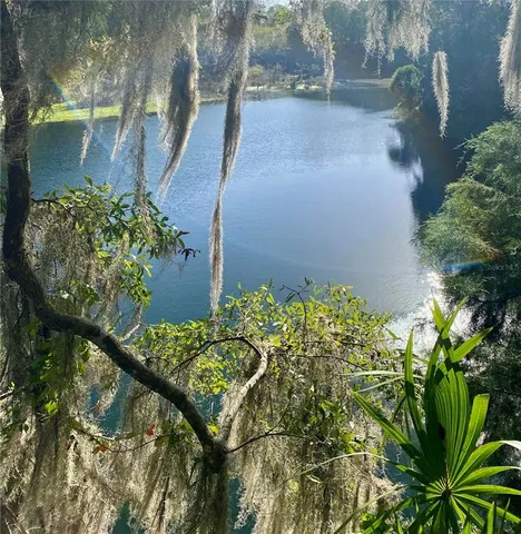 a backyard of a house with outdoor seating