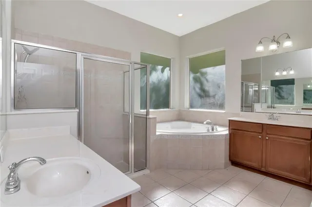 a bathroom with a bathtub and a sink