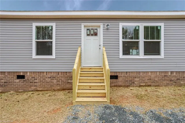 $595,000 | 4045 Feather Pond Drive, East Bend, NC 27018