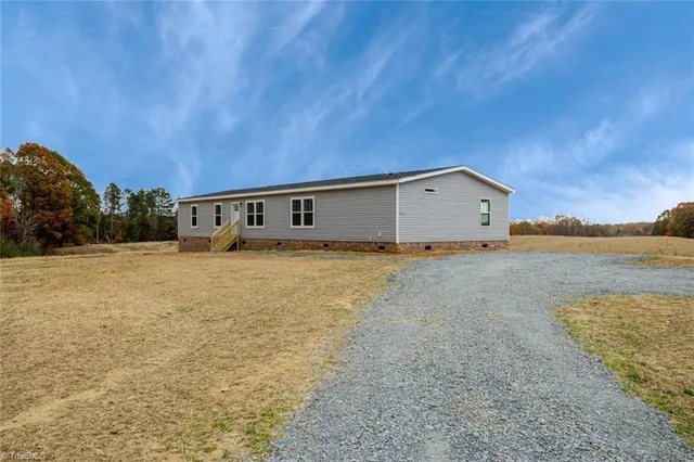 $595,000 | 4045 Feather Pond Drive, East Bend, NC 27018