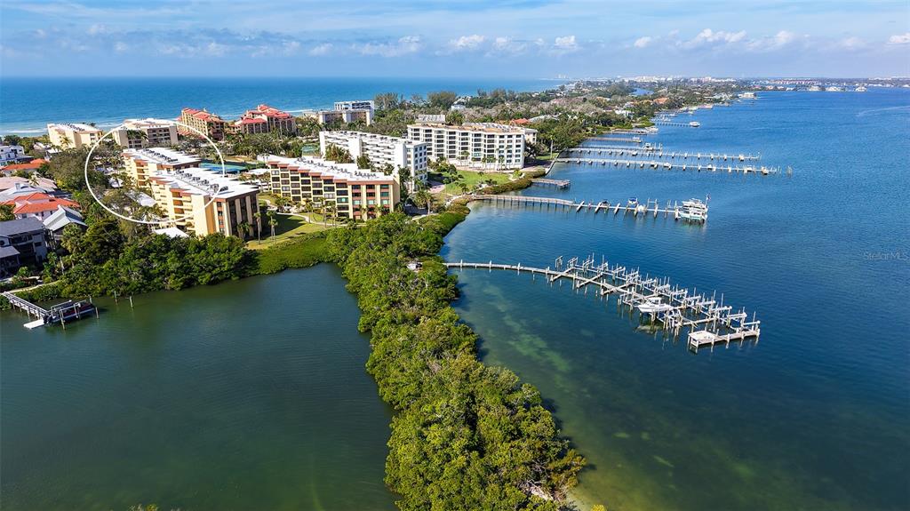 8773 Midnight Pass Road, Unit 102G Sarasota, FL 34242 - Photo 37 of 79 a view of a city with ocean view