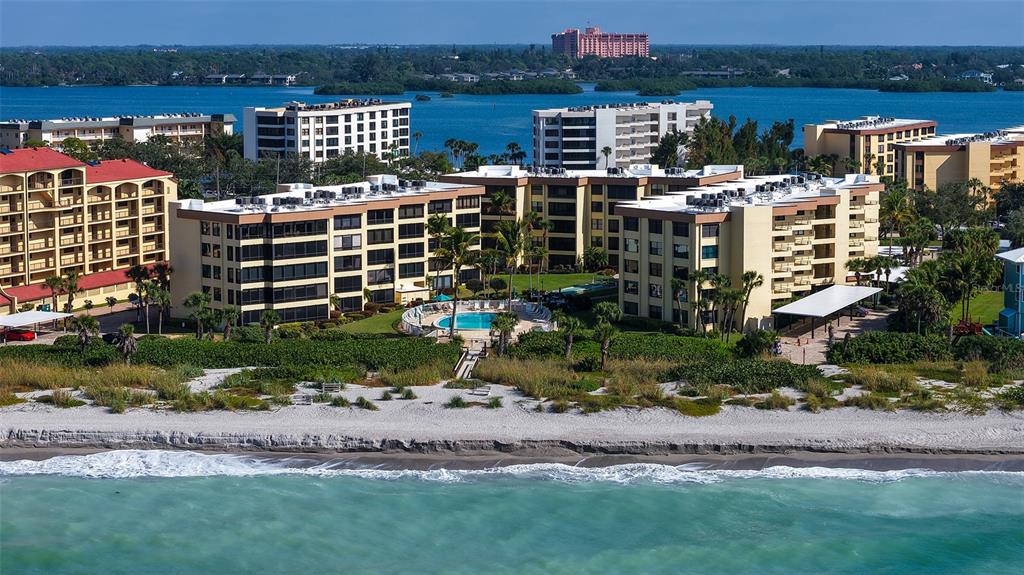 8773 Midnight Pass Road, Unit 102G Sarasota, FL 34242 - Photo 63 of 79 a view of a city with tall buildings