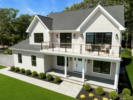 a aerial view of a house with a big yard
