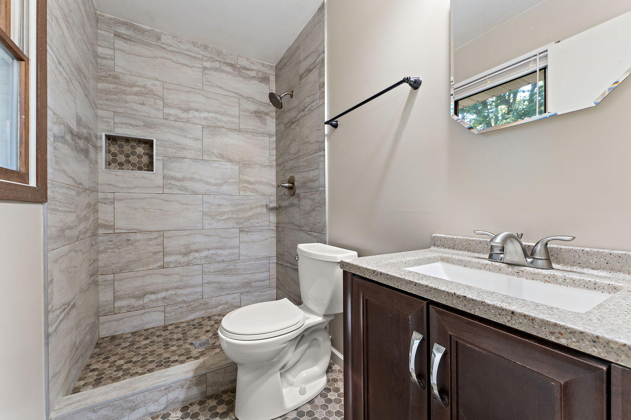 586 Fargo Road Westville, IN 46391 - Photo 18 of 40 a bathroom with a granite countertop sink toilet and shower