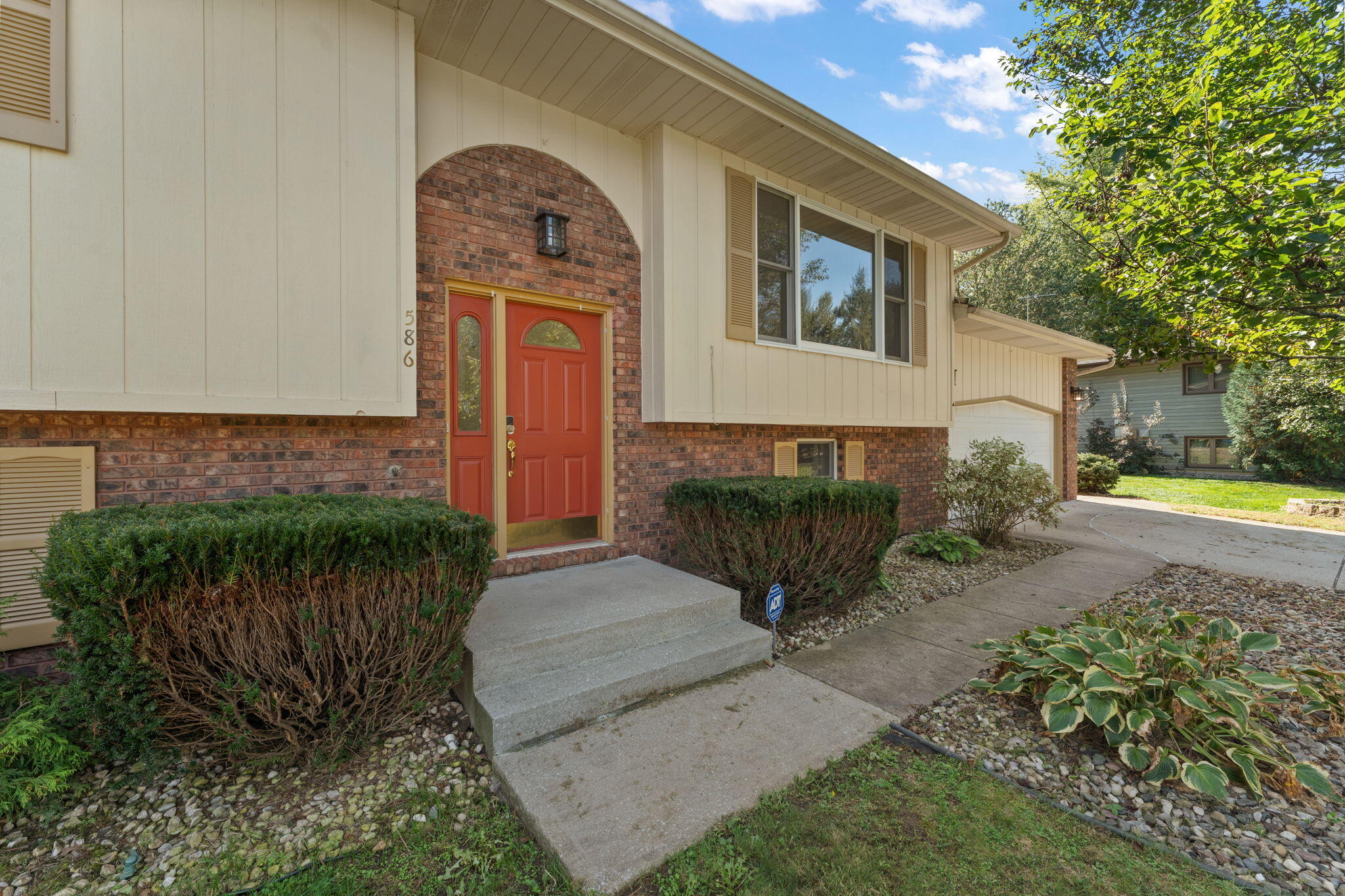 586 Fargo Road Westville, IN 46391 - Photo 3 of 40 a front view of a house with garden