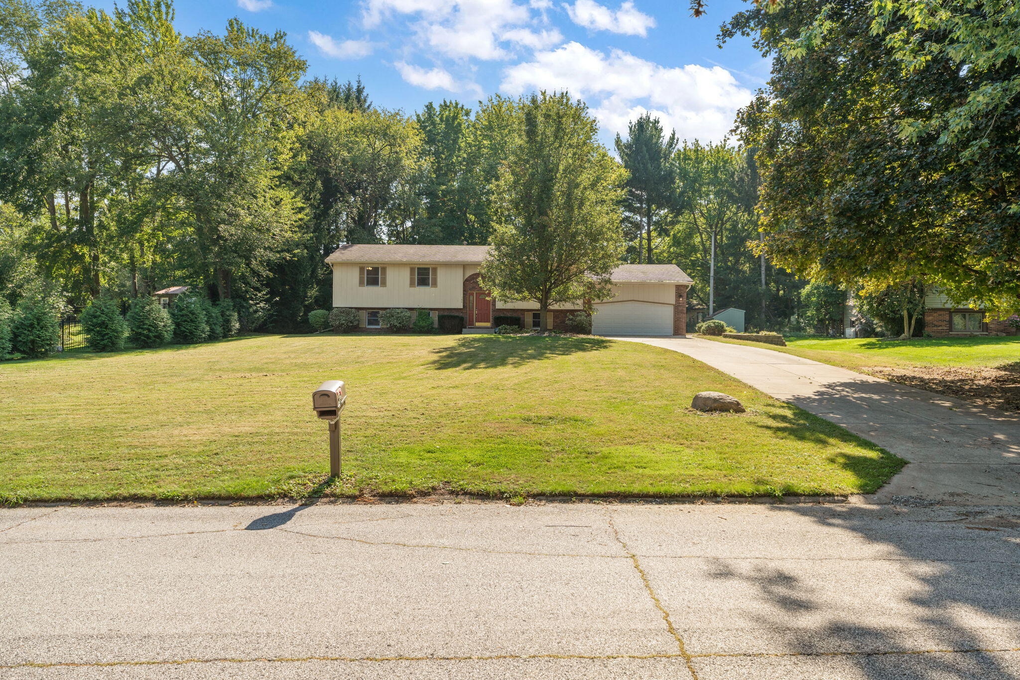 586 Fargo Road Westville, IN 46391 - Photo 32 of 40 a view of a swimming pool with a yard and large trees