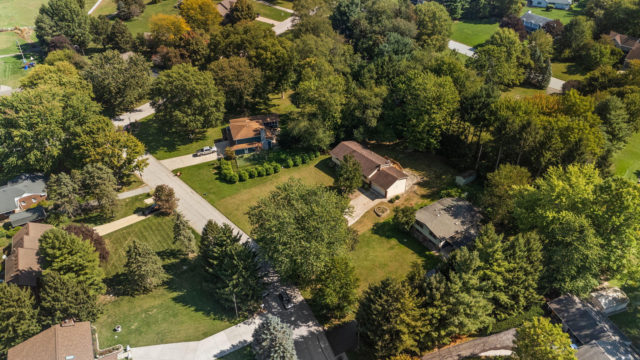 586 Fargo Road Westville, IN 46391 - Photo 36 of 40 an aerial view of residential house with outdoor space and trees all around