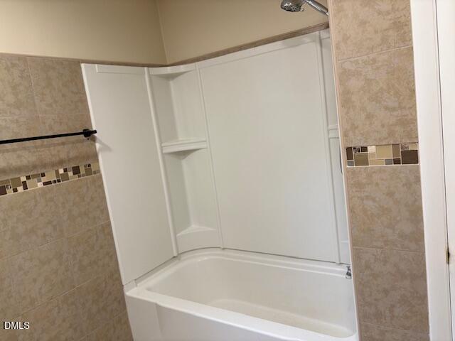 1208 Hatch Road Chapel Hill, NC 27516 - Photo 20 of 33 a white bath tub sitting next to a white wall