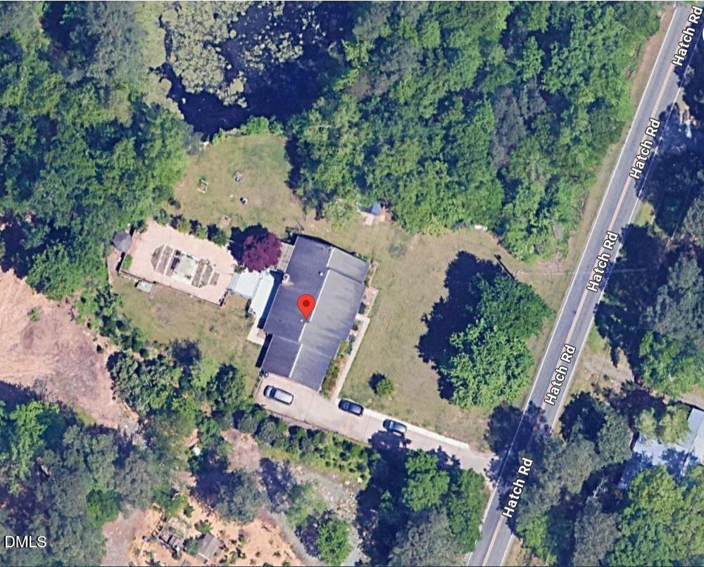 1208 Hatch Road Chapel Hill, NC 27516 - Photo 32 of 33 an aerial view of a house with a garden