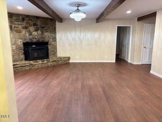 1208 Hatch Road Chapel Hill, NC 27516 - Photo 8 of 33 an empty room with wooden floor & a fireplace