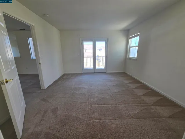 an empty room with windows