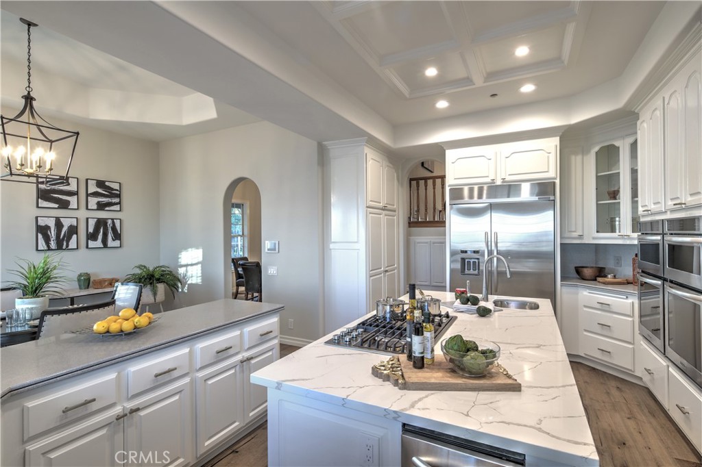 1016 Briarcliff Road Monrovia, CA 91016 - Photo 19 of 70 a kitchen with counter top space cabinets stainless steel appliances and windows