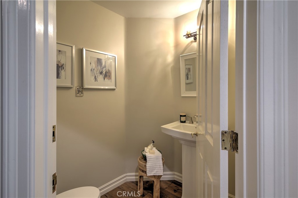 1016 Briarcliff Road Monrovia, CA 91016 - Photo 28 of 70 a bathroom with a sink mirror and toilet