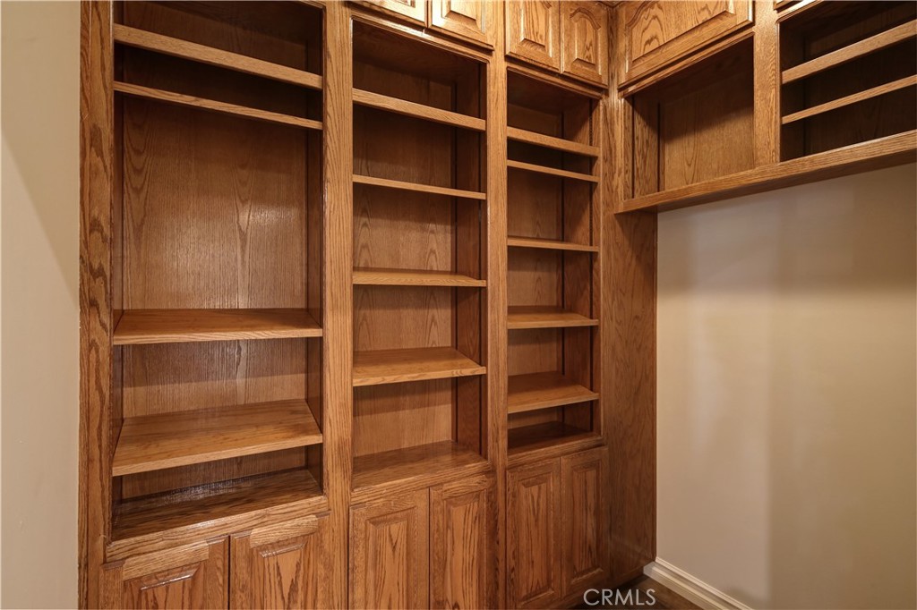 1016 Briarcliff Road Monrovia, CA 91016 - Photo 33 of 70 a view of walk in closet with empty racks