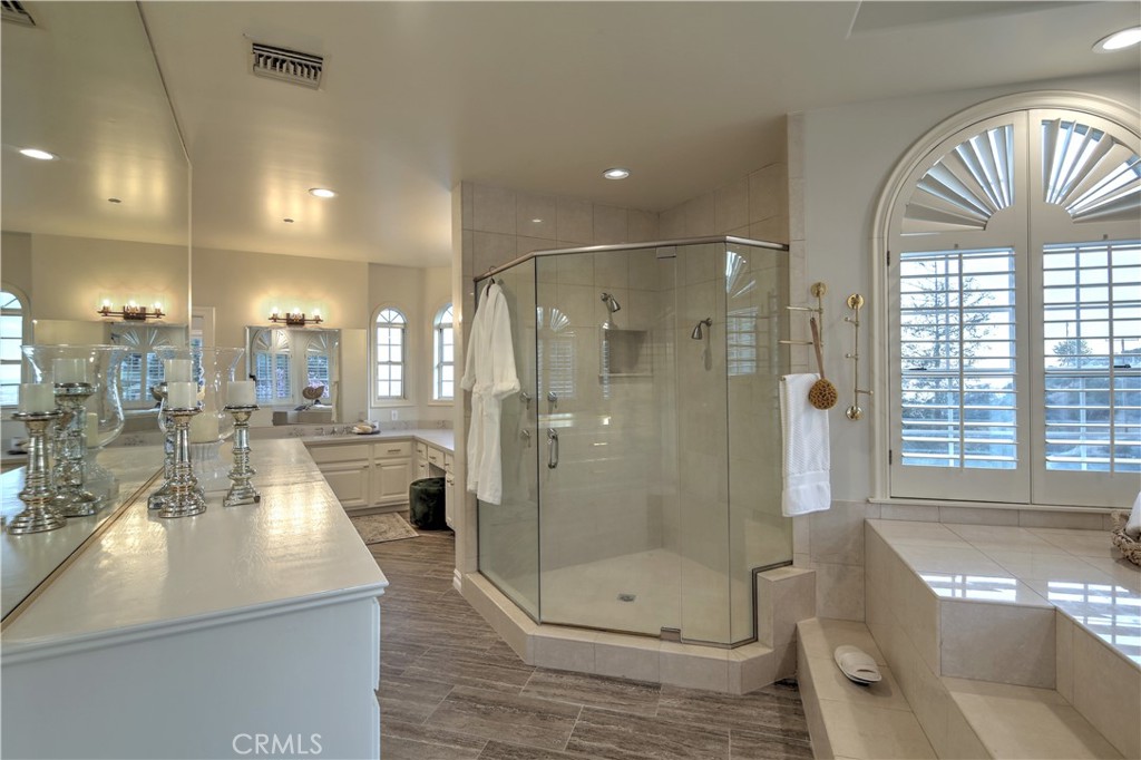1016 Briarcliff Road Monrovia, CA 91016 - Photo 41 of 70 a bathroom with a glass shower door
