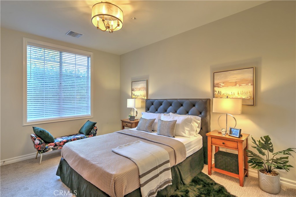1016 Briarcliff Road Monrovia, CA 91016 - Photo 45 of 70 a bedroom with a bed and a window