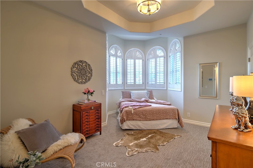1016 Briarcliff Road Monrovia, CA 91016 - Photo 47 of 70 a bedroom with bed and a chair