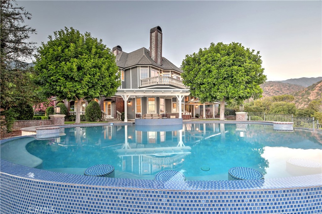 1016 Briarcliff Road Monrovia, CA 91016 - Photo 61 of 70 a view of a house with a yard