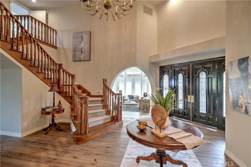 1016 Briarcliff Road Monrovia, CA 91016 - Photo 10 of 70 a living room with fireplace furniture and a wooden floor
