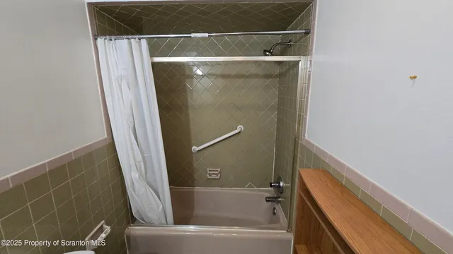 a bathroom with a bathtub