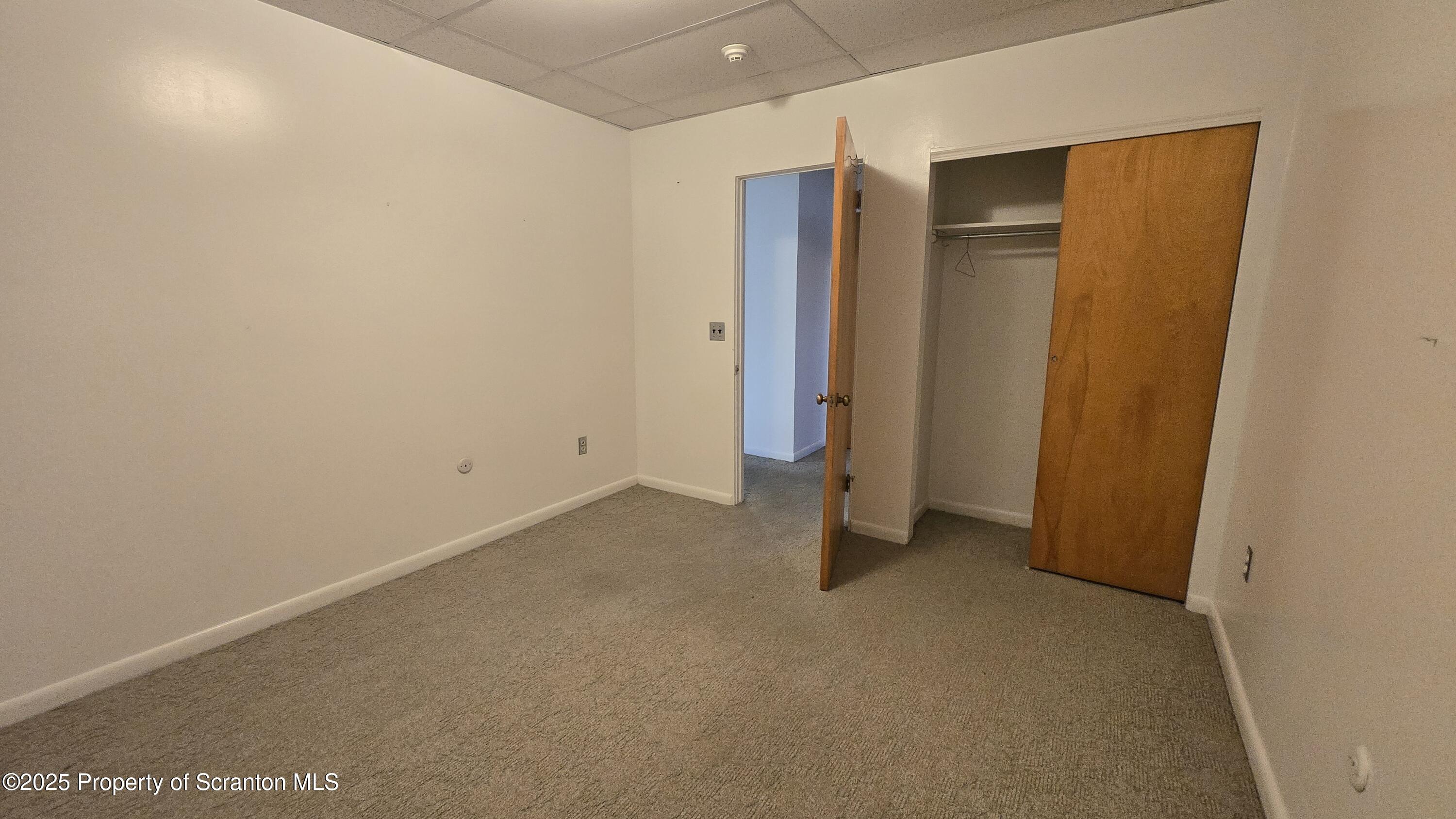 3730 Lawrence Avenue, Unit 7 Moosic, PA 18507 - Photo 8 of 10 a view of an empty room