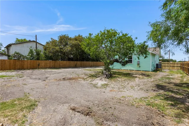 a view of a wooden fence