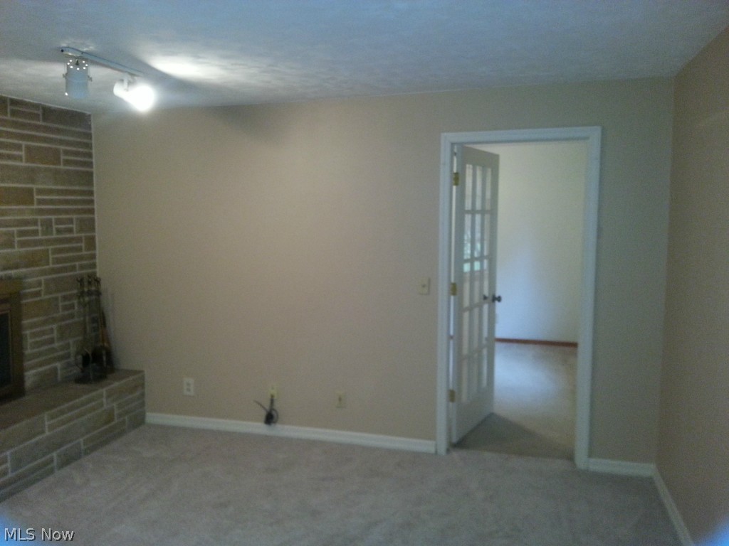 8880 Root Road North Ridgeville, OH 44039 - Photo 9 of 24 the den is off of the family room(or you can turn this den into bedroom#5)